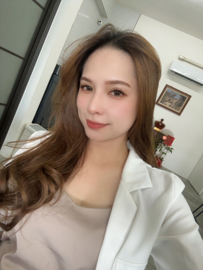 房仲 喬喬 照片